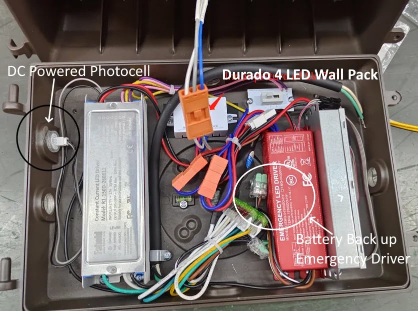 Durado 4 wall pack, same housing as the Durado III, open showing photocell and emergency battery backup
