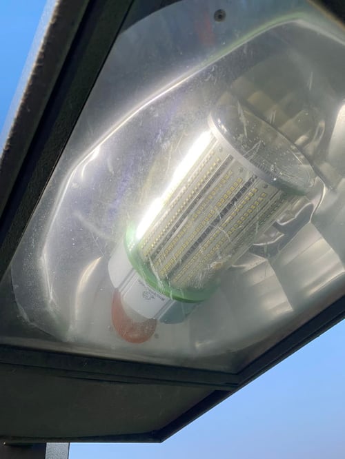 LED light bulb installed in a parking lot fixture showing E39 mogul base application