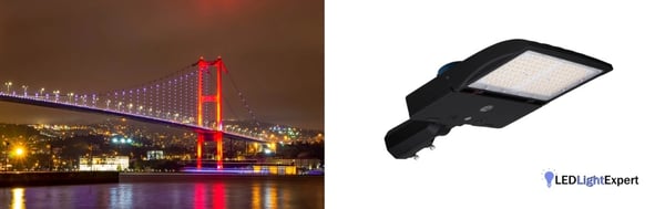 LED flood lights illuminating a modern bridge at night