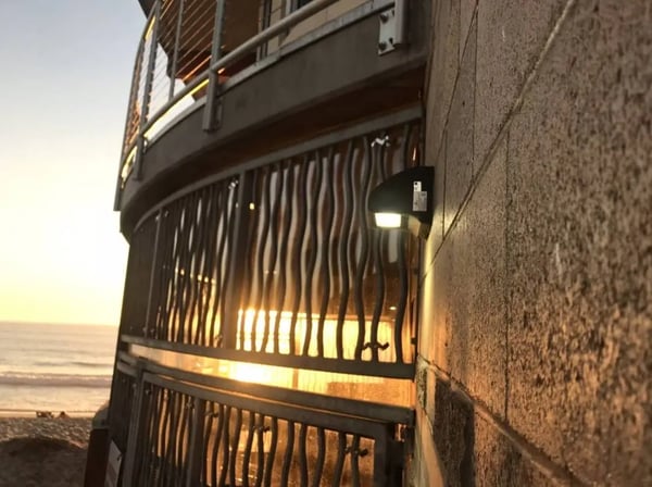 Adjustable dark sky compliant LED wall light installation