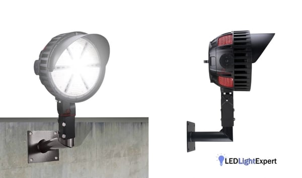 Single Arm Bullhorn Adapter supporting LED sports light on building wall