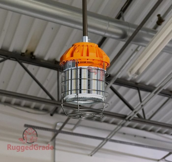 LED temporary construction lights mounted on tripod at active jobsite