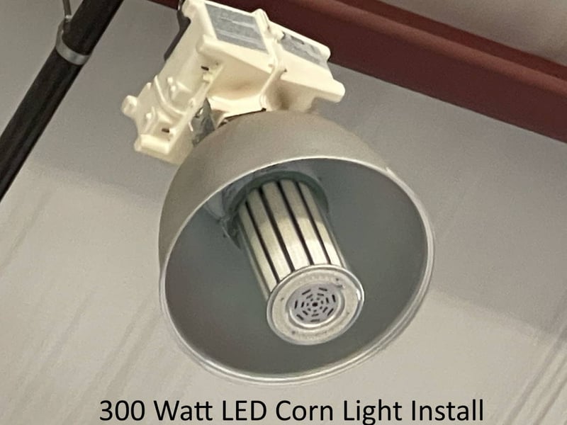 300 watt LED corn light bulb installed in high hat fixture
