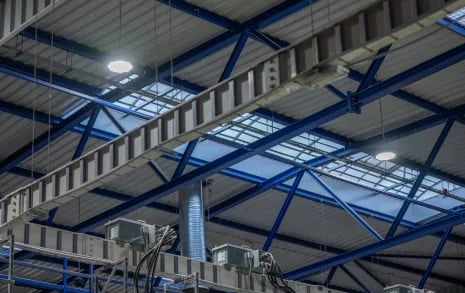 Commercial high bay LED lights with battery backup in warehouse