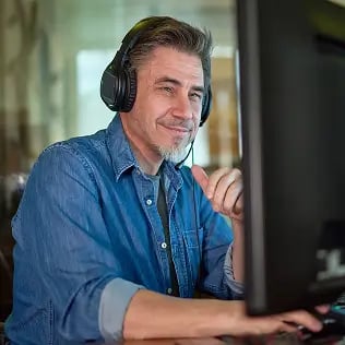 Lighting Expert at computer