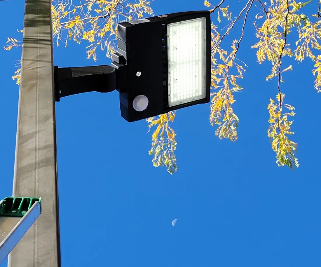 LED parking lot light with motion sensor &mdash; installed on pole