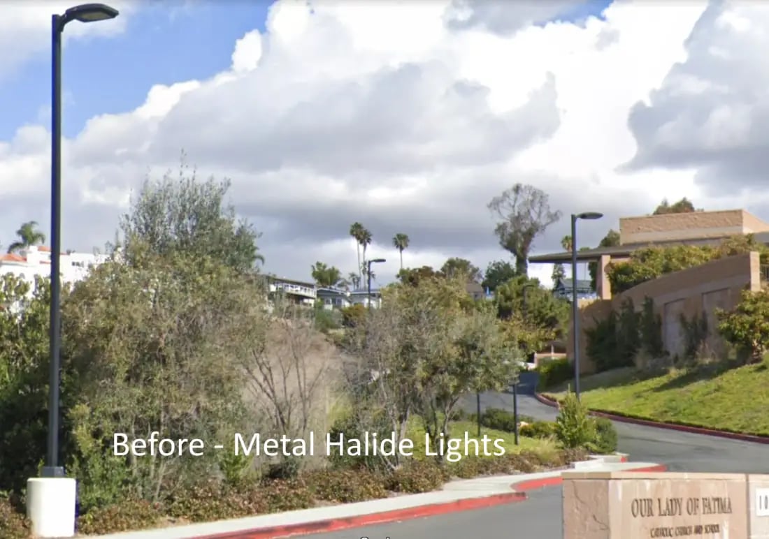 Before &mdash; Our Lady of Fatima Church parking lot with old 250W metal halide fixtures
